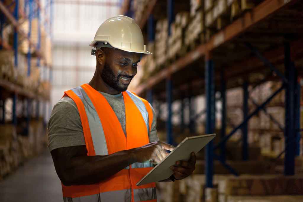 a warehouse worker managing manufacturing inventory